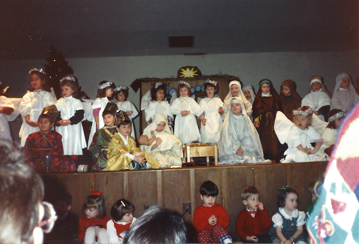 Preschoolers in costumes re-enacting the Nativity scene