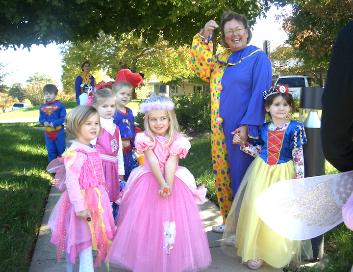 Teachers and students dressed in Halloween costumes