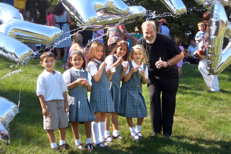 Fr. Bill and second-graders at Opening Day 2007