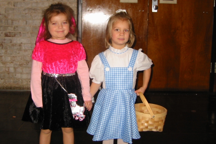 Two preschoolers in Halloween outfits